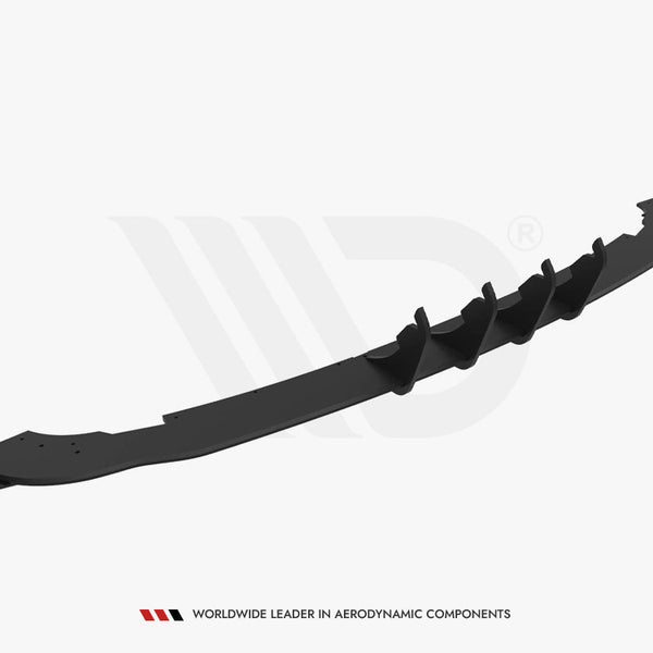 A black aerodynamic car diffuser with multiple vertical fins, positioned on a white background. Text reads "WORLDWIDE LEADER IN AERODYNAMIC COMPONENTS" beneath the image.