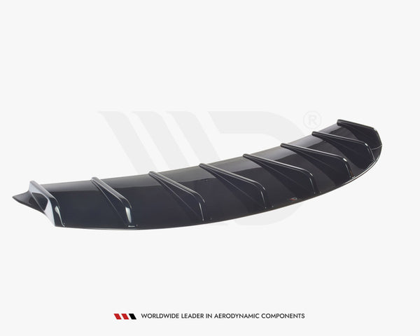 A black aerodynamic car diffuser, featuring multiple vertical fins, rests on a plain white background. Text: "WORLDWIDE LEADER IN AERODYNAMIC COMPONENTS" appears below the object.