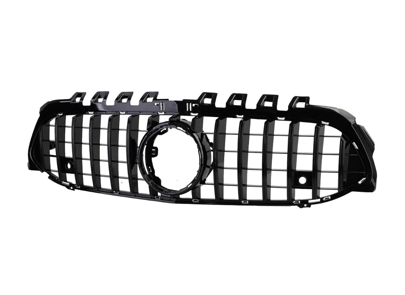 A black car grille with vertical slats, featuring a prominent circular emblem space in the center, isolated against a white background.