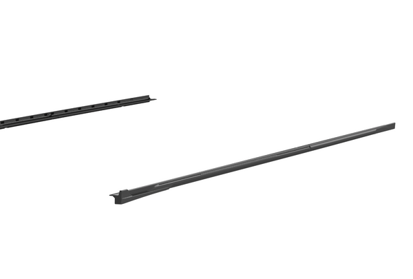 Two elongated, dark-toned linear metal bars are positioned diagonally, aligned parallel, and floating against a white background. One bar is closer, appearing more detailed, with grooves and subtle textures.