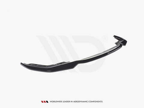 A sleek, black aerodynamic car spoiler lies on a plain white background. Text reads: "WORLDWIDE LEADER IN AERODYNAMIC COMPONENTS."