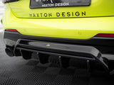 Bright yellow car features a black rear diffuser. 