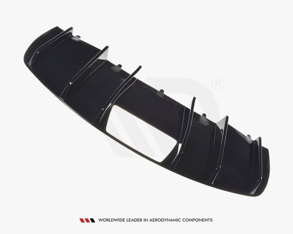 Black aerodynamic car diffuser with vertical fins, displayed against a plain white background. Text reads: "WORLDWIDE LEADER IN AERODYNAMIC COMPONENTS."