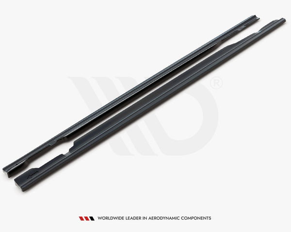Two long, dark aerodynamic components lay parallel on a white surface. Text below reads, "WORLDWIDE LEADER IN AERODYNAMIC COMPONENTS."