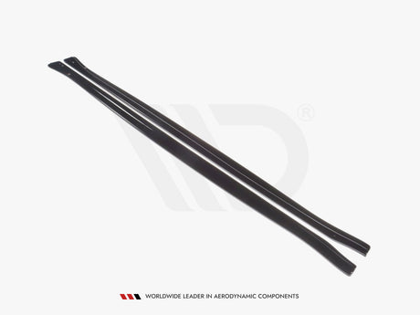 Two sleek, black aerodynamic components lie parallel on a white background. Below them, text reads: "WORLDWIDE LEADER IN AERODYNAMIC COMPONENTS."