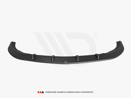 A black car lip spoiler with vertical fins lies isolated on a plain background. Text below reads: "WORLDWIDE LEADER IN AERODYNAMIC COMPONENTS."
