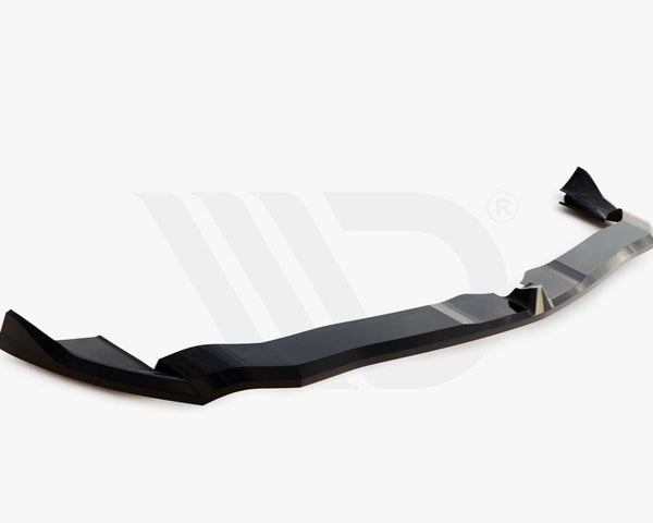 A black aerodynamic car component lies on a white background. Text: "WORLDWIDE LEADER IN AERODYNAMIC COMPONENTS" is at the bottom.