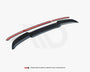 Two aerodynamic car components, one red and one black, are displayed on a plain white background. Text reads: "WORLDWIDE LEADER IN AERODYNAMIC COMPONENTS."