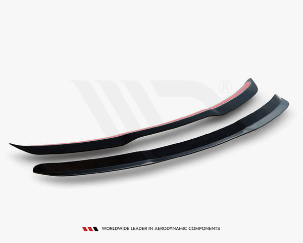 Two black aerodynamic car components rest on a white background, showcasing their sleek, curved design. Text below reads: "WORLDWIDE LEADER IN AERODYNAMIC COMPONENTS."
