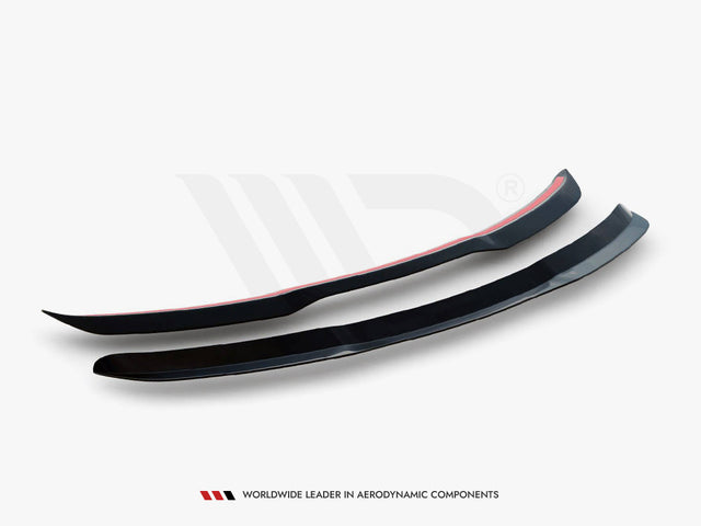 Two black aerodynamic car components rest on a white background, showcasing their sleek, curved design. Text below reads: "WORLDWIDE LEADER IN AERODYNAMIC COMPONENTS."