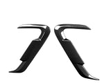 Two black carbon fiber hooks face each other, angled inward, against a plain white background.