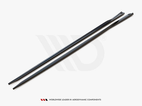 Two sleek, elongated black strips with tapered ends rest side-by-side on a plain gray surface. Text reads, "WORLDWIDE LEADER IN AERODYNAMIC COMPONENTS."