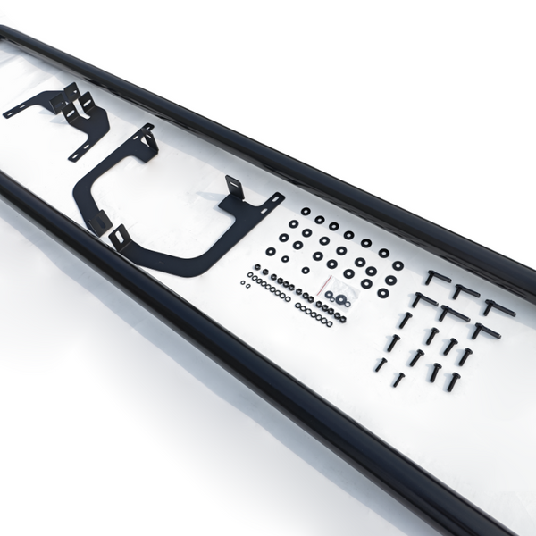 Metal brackets, bolts, and washers are neatly arranged in rows on a white background, with two long black bars parallel, framing the components.