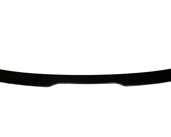 A black car spoiler lies flat against a white background, emphasizing its sleek, curved design and aerodynamic form.