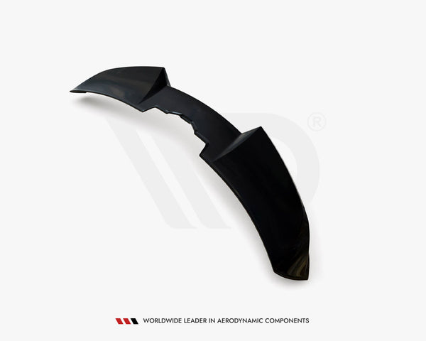 A black aerodynamic component, shaped and angled, rests on a plain white background. Text reads: "WORLDWIDE LEADER IN AERODYNAMIC COMPONENTS."