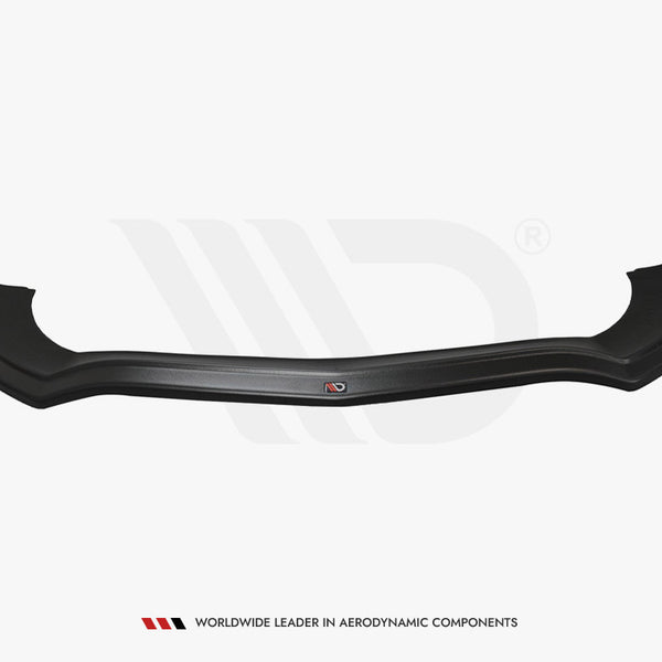 A black aerodynamic component with a sleek, curved design, displayed against a plain background. Text beneath reads: "Worldwide leader in aerodynamic components."