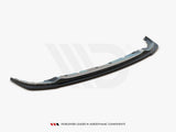 A curved, black aerodynamic car component rests on a plain white background. Text below reads, 