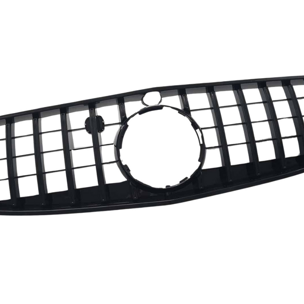A black car grille with horizontal and vertical slats features a large circular opening in the center, designed for vehicle front ends, isolated on a white background.