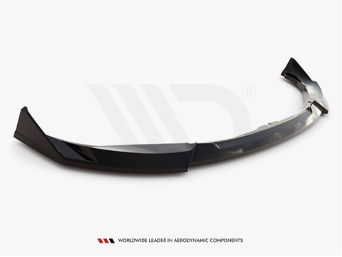 A curved, glossy black car spoiler sits on a white background. Text reads: "Worldwide Leader in Aerodynamic Components."