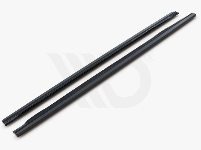 Two sleek, black aerodynamic components lie parallel on a light background. Text below reads: "WORLDWIDE LEADER IN AERODYNAMIC COMPONENTS."