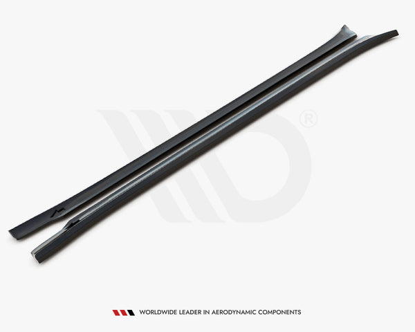 Two elongated, black aerodynamic bars lay side by side on a white surface. Text reads: "WORLDWIDE LEADER IN AERODYNAMIC COMPONENTS" at the bottom.