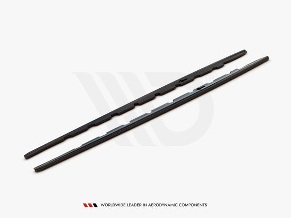 Two black aerodynamic wiper blades rest side by side on a white surface. Text below reads: "WORLDWIDE LEADER IN AERODYNAMIC COMPONENTS."