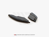 Two black aerodynamic components rest on a white surface, showcasing their sleek, angular design. Text below reads: "WORLDWIDE LEADER IN AERODYNAMIC COMPONENTS."