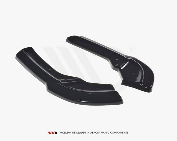 Two black, aerodynamic car components are displayed side by side on a plain white background. Text reads, "WORLDWIDE LEADER IN AERODYNAMIC COMPONENTS."