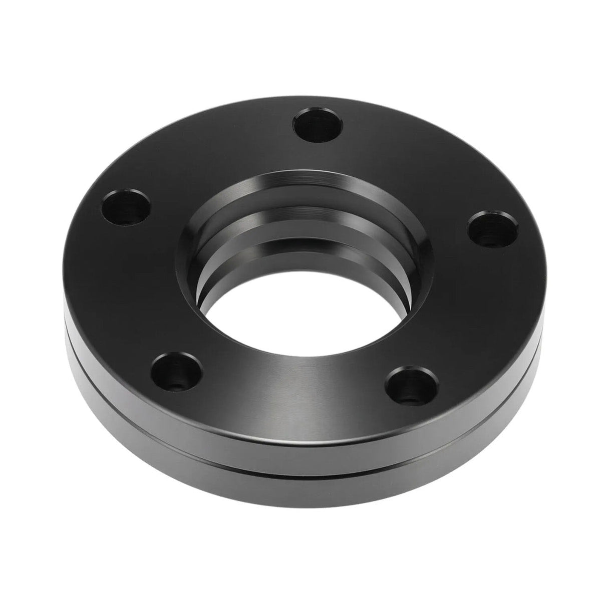 A black, circular metal flange with five bolt holes and a threaded central opening, rests in a white background, suggesting functionality in industrial or mechanical settings.