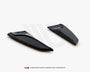 Two sleek, black aerodynamic components are positioned on a plain white background. Text at the bottom reads: "WORLDWIDE LEADER IN AERODYNAMIC COMPONENTS."