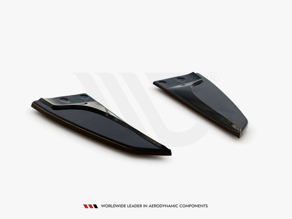 Two sleek, black aerodynamic components are positioned on a plain white background. Text at the bottom reads: "WORLDWIDE LEADER IN AERODYNAMIC COMPONENTS."