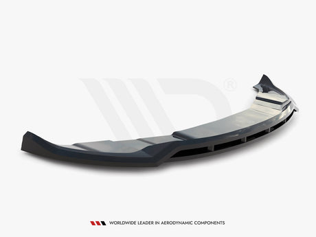 A sleek, black car spoiler rests on a white surface, featuring angular lines and vents, with the text "WORLDWIDE LEADER IN AERODYNAMIC COMPONENTS" below it.