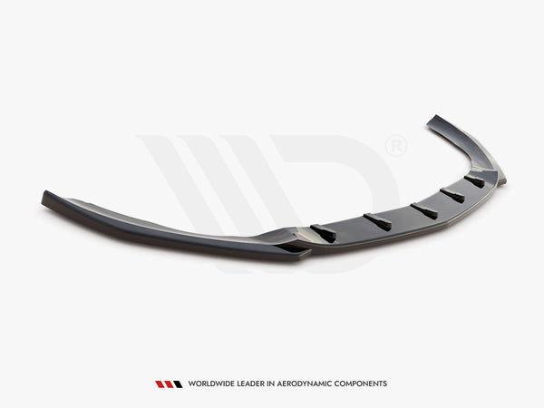 A glossy black car spoiler, featuring angular fins, rests on a plain white background. Text at the bottom reads, "WORLDWIDE LEADER IN AERODYNAMIC COMPONENTS."