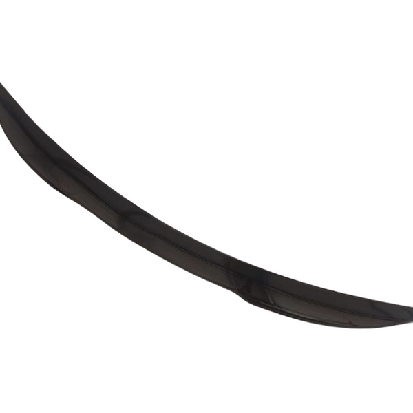 A curved, black, elongated car spoiler is positioned against a plain white background, showcasing its sleek aerodynamic design.