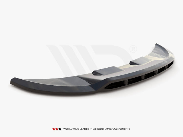 Curved car spoiler resting on a flat surface, featuring aerodynamic vents and a glossy finish. Below, text reads: "WORLDWIDE LEADER IN AERODYNAMIC COMPONENTS." The background is plain white.