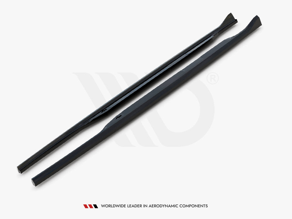 Two black, elongated aerodynamic components lie parallel on a white surface, featuring smooth edges. Below, text reads: "WORLDWIDE LEADER IN AERODYNAMIC COMPONENTS."