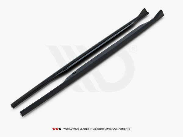 Two black, elongated aerodynamic components lie parallel on a white surface, featuring smooth edges. Below, text reads: "WORLDWIDE LEADER IN AERODYNAMIC COMPONENTS."