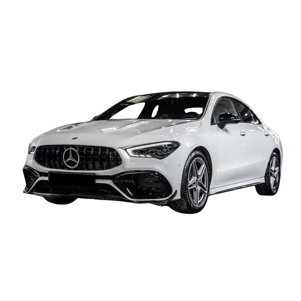 A white Mercedes sedan with a sleek design and star emblem grille is parked, showcasing its modern styling and five-spoke alloy wheels against a plain white background.