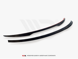 Two curved, black aerodynamic components rest on a white surface. Beneath, the text reads: 