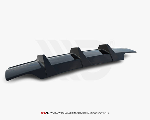 A sleek, dark-colored car rear diffuser with three vertical fins, positioned on a plain white background. Text: "WORLDWIDE LEADER IN AERODYNAMIC COMPONENTS" at the bottom.
