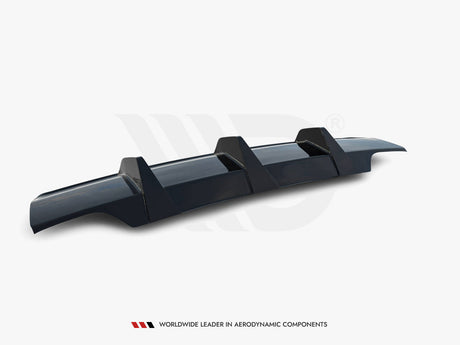 A sleek, dark-colored car rear diffuser with three vertical fins, positioned on a plain white background. Text: "WORLDWIDE LEADER IN AERODYNAMIC COMPONENTS" at the bottom.