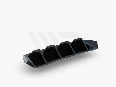 A black, angular aerodynamic component with four vertical fins, resting on a white surface. Text below reads: "WORLDWIDE LEADER IN AERODYNAMIC COMPONENTS."