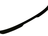 A black car spoiler is shown on a white background, curved and smooth, designed to enhance aerodynamics when attached to a vehicle.