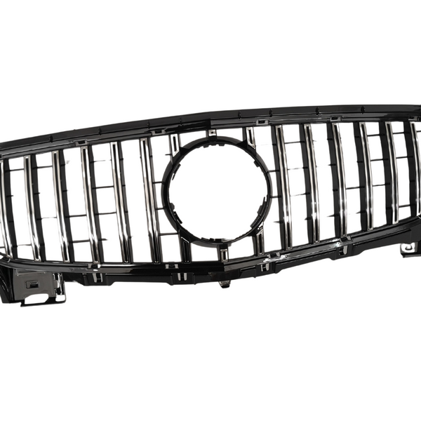 A black car grille with vertical chrome slats and a circular emblem space at the center, against a plain white background.