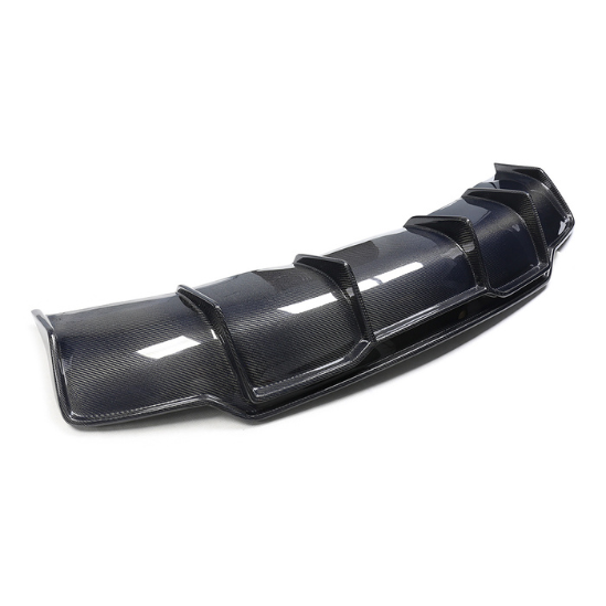 A black carbon fiber car rear diffuser with multiple vertical fins is displayed on a plain white background, showcasing its aerodynamic design for improved vehicle performance.