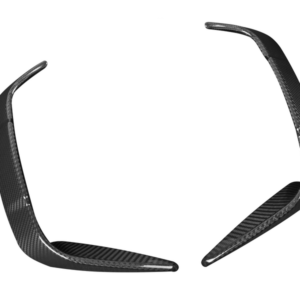 Two curved carbon fiber car parts angled towards each other with a sleek finish, positioned against a plain white background.