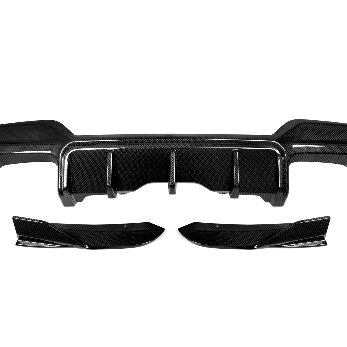 A carbon fiber car rear diffuser and side attachments, arranged on a white background, showcasing their sleek, aerodynamic structure and textured surface.