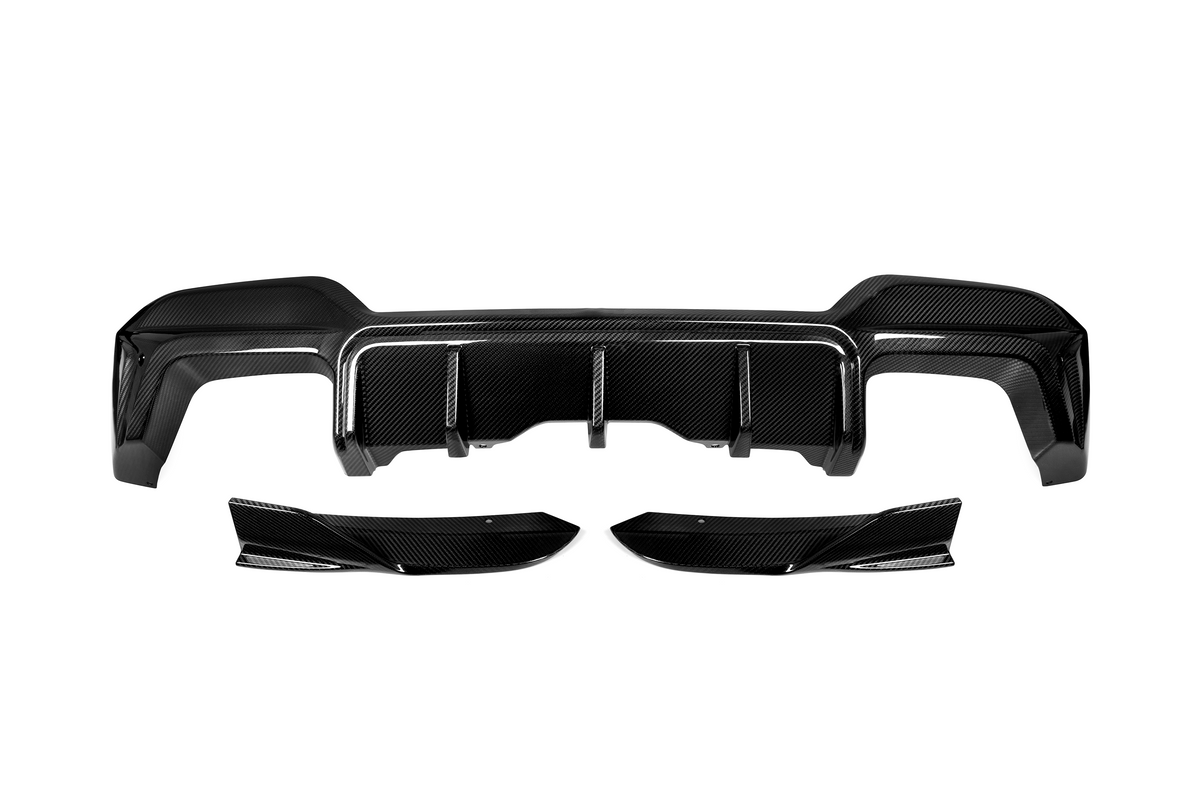 A carbon fiber car rear diffuser and side attachments, arranged on a white background, showcasing their sleek, aerodynamic structure and textured surface.