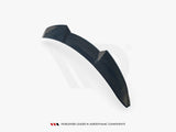 A curved, sleek black automotive spoiler is presented at an angle, on a plain white background. Text reads, 