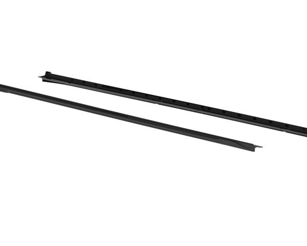 Two sleek black linear components lie parallel; segmented with grooves, likely parts for assembly or structural support, positioned on a plain white background.